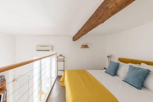 Posteľ alebo postele v izbe v ubytovaní iFlat Yellow Monti Studio Apartment