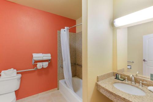 A bathroom at Sleep Inn & Suites Midland West