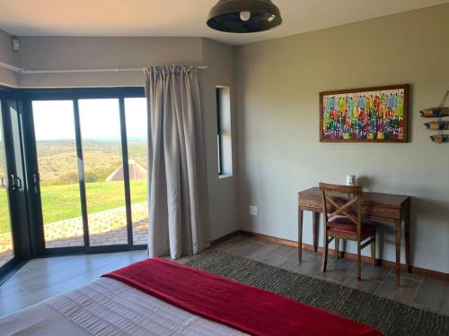 Χώρος καθιστικού στο Jbay Zebra Lodge