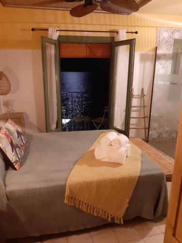 Кровать или кровати в номере Joanna Hotel