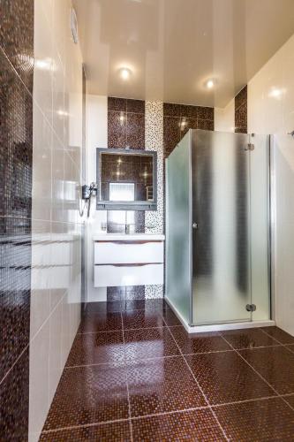 Kuchyň nebo kuchyňský kout v ubytování Hotel Premier