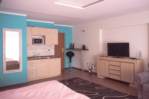 Η κουζίνα ή μικρή κουζίνα στο Apartamenty Kornel
