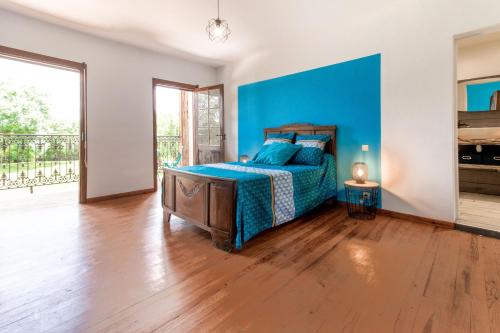 Ένα ή περισσότερα κρεβάτια σε δωμάτιο στο Le Relais de Soubeille