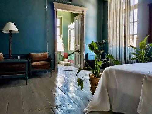 Postel nebo postele na pokoji v ubytování 1900 Hotel