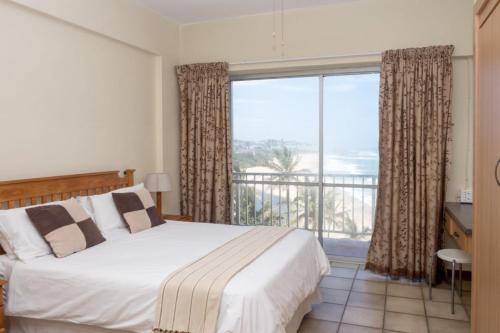 Кровать или кровати в номере Seabrook holiday apartments