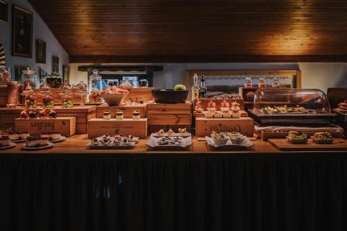 a display of food on a table in a store at Boutique penzion Rech in Blansko