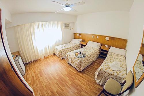 Ένα ή περισσότερα κρεβάτια σε δωμάτιο στο Hostal Del Sol Spa