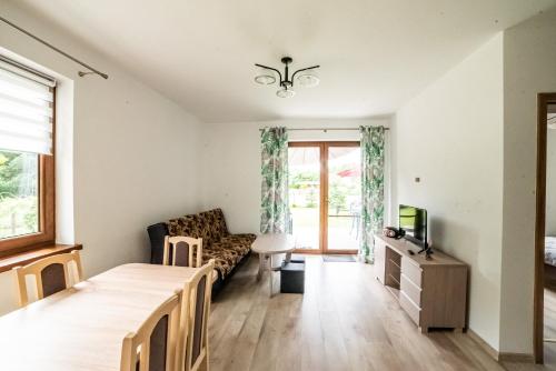 Posteľ alebo postele v izbe v ubytovaní Domek U Krzysia