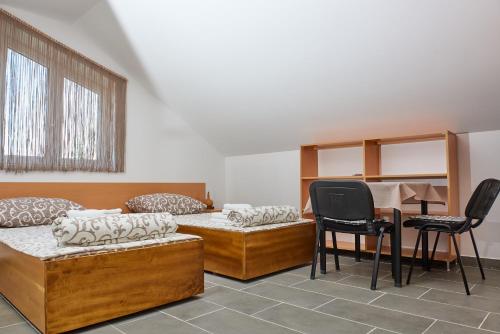 Кровать или кровати в номере Sakota family house