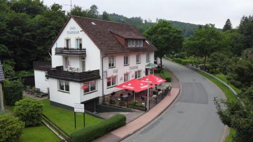 an overhead view of a building on a street at Pension Waldschloß in Holzminden
