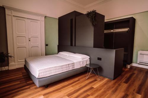 Ein Bett oder Betten in einem Zimmer der Unterkunft Nova Relais