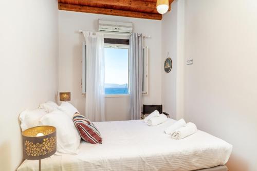 Posteľ alebo postele v izbe v ubytovaní Pandoras Home - Old Town Naxos