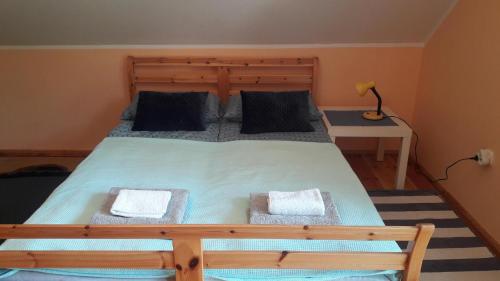 
Łóżko lub łóżka w pokoju w obiekcie Kofi Garden
