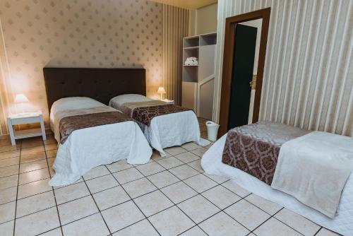 Uma cama ou camas num quarto em Cafezal Palace Hotel