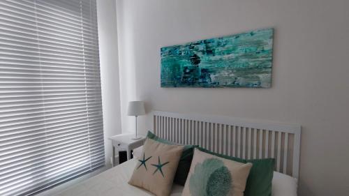 Posteľ alebo postele v izbe v ubytovaní APARTAMENTOS MINA4 tipo I