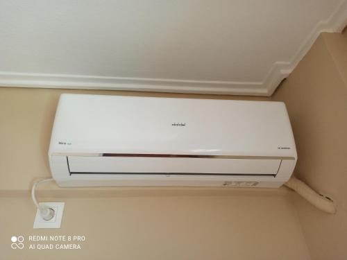 a dvd player sitting on top of a ceiling at Lavender2 in Kalamata