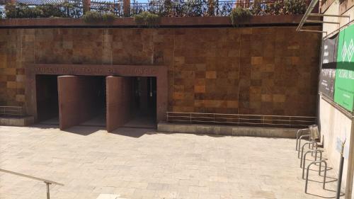 a brick wall with two entrances to a building at BioHomeValencia in Valencia