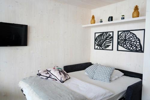 Posteľ alebo postele v izbe v ubytovaní Boutique style eco-beachhouse, private jacuzzi