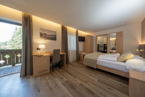 Ένα ή περισσότερα κρεβάτια σε δωμάτιο στο Hotel Canada