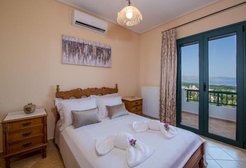 Tempat tidur dalam kamar di Hilltop Villa Kontomari