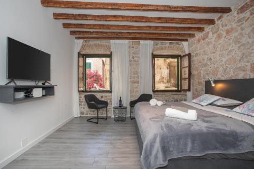 Postel nebo postele na pokoji v ubytování Apartment Libra downtown Šibenik