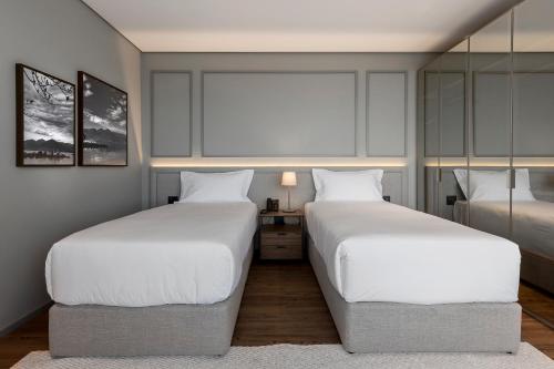 Cama o camas de una habitación en K-Platz Hotel