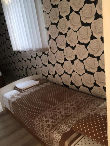 Postel nebo postele na pokoji v ubytování Гостиный Дом Comfort