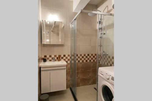 Et badeværelse på Etern Stays - Bohemian Apartment