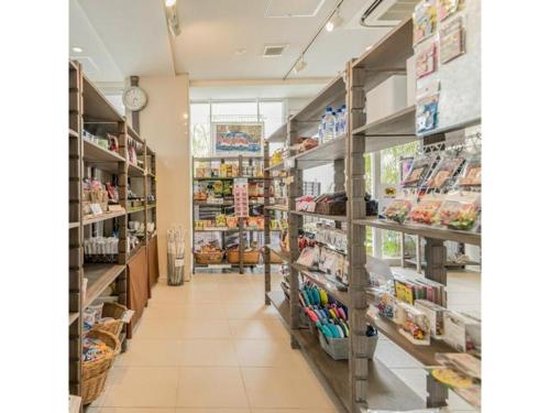 a grocery store aisle with shelves of food at HOTEL GranView Garden OKINAWA - Vacation STAY 44963v in Tomigusuku