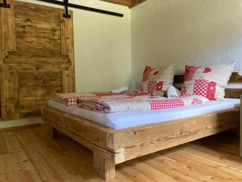 Postel nebo postele na pokoji v ubytování Gletscher Chalet