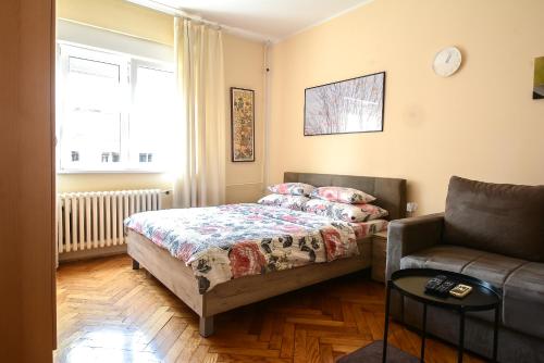 Кровать или кровати в номере Apartment Petra 071