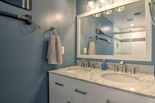 a bathroom with a sink and a mirror at Pet-Friendly Ocean City Home Half Mile to Beach! in Ocean City