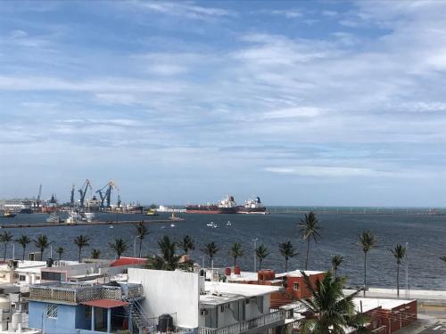 a view of a harbor with boats in the water at Hotel Dorado a una calle de Playa Regatas y el Malecon in Veracruz