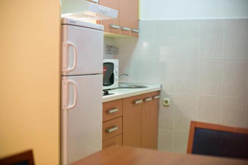 Kuchyň nebo kuchyňský kout v ubytování Epicenter Apartments Split