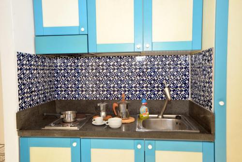 Köök või kööginurk majutusasutuses Dammusi al Tramonto