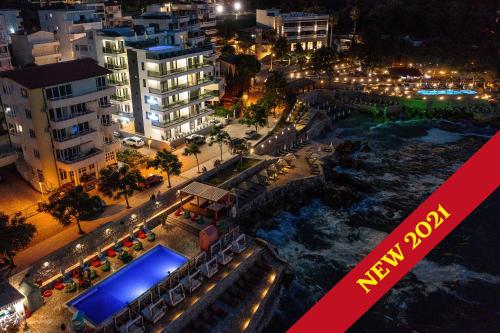 an aerial view of a city at night at APARTMENTS MERLIN in Dobra Voda