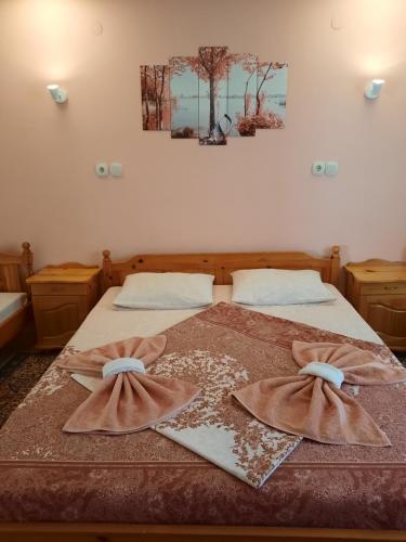 Ένα ή περισσότερα κρεβάτια σε δωμάτιο στο Guest House Lazar Raykov