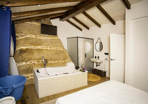 Ένα ή περισσότερα κρεβάτια σε δωμάτιο στο Casa Rural Costa Azul