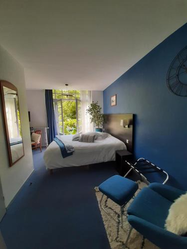Ένα ή περισσότερα κρεβάτια σε δωμάτιο στο Hotel Régina