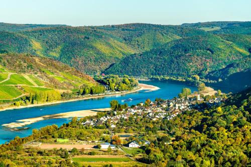 an aerial view of a river and a town at Lindenhof in Osterspai