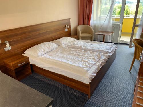 Postel nebo postele na pokoji v ubytování Apartmány wellness Frymburk