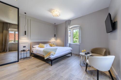 Voodi või voodid majutusasutuse Dora rooms and studios toas