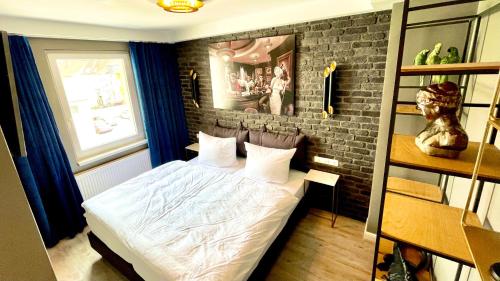 Postel nebo postele na pokoji v ubytování IQ Hotel Hannover