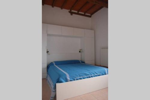 Una cama o camas en una habitación de La Pergoletta