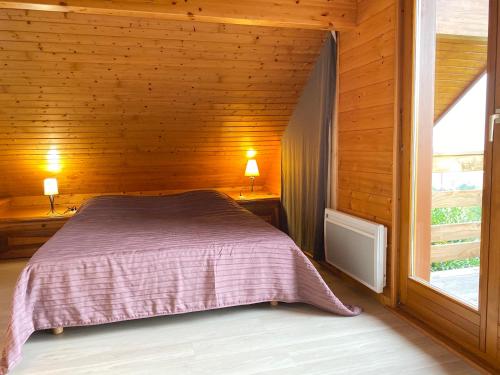 Ένα ή περισσότερα κρεβάτια σε δωμάτιο στο Chalet Miel