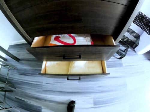 a room with some boxes on the floor at #5 New! Cozy Getaway Hot Spot Hilo Keaau Big Island of Hawaii Self CheckIn Studio Apt in Keaau
