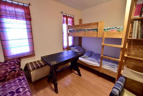 Poschodová posteľ alebo postele v izbe v ubytovaní Igricz Farmház