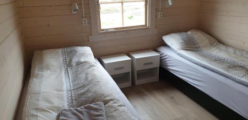 Ένα ή περισσότερα κρεβάτια σε δωμάτιο στο Hvammur 5 with private hot tub
