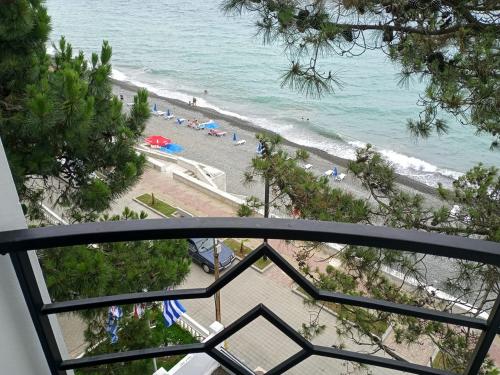 a view of a beach from a balcony at Hotel Medusa in K'obulet'i