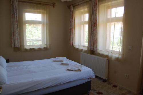 Säng eller sängar i ett rum på Cappadocian Special House